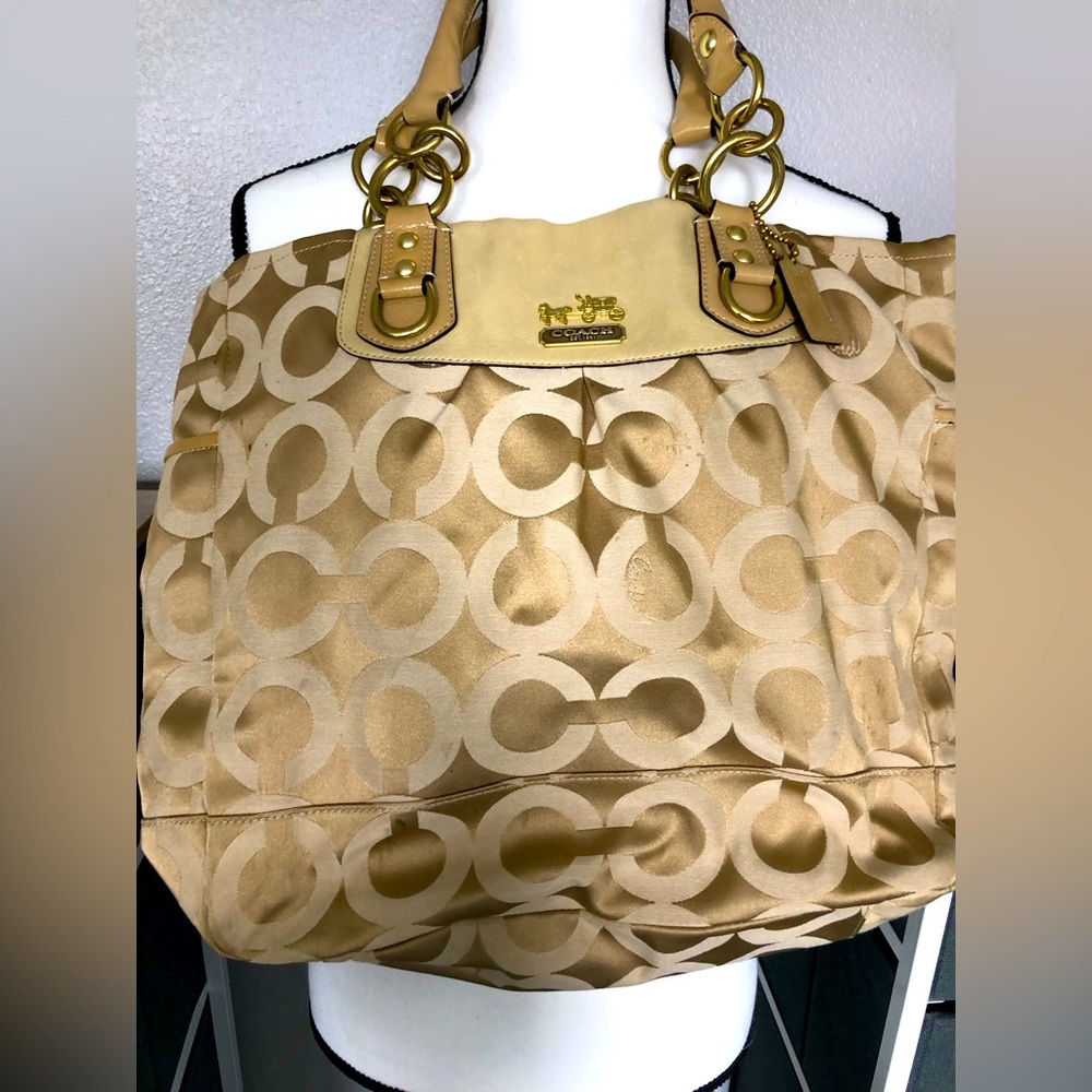 This is a vintage coach bag that is used